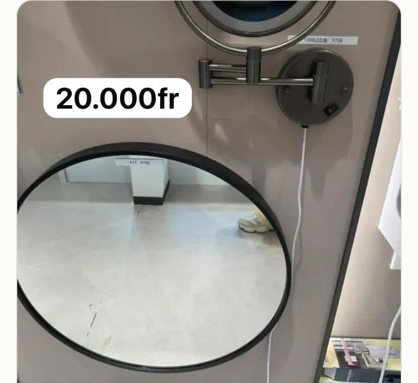 Miroir rond avec cadre noir